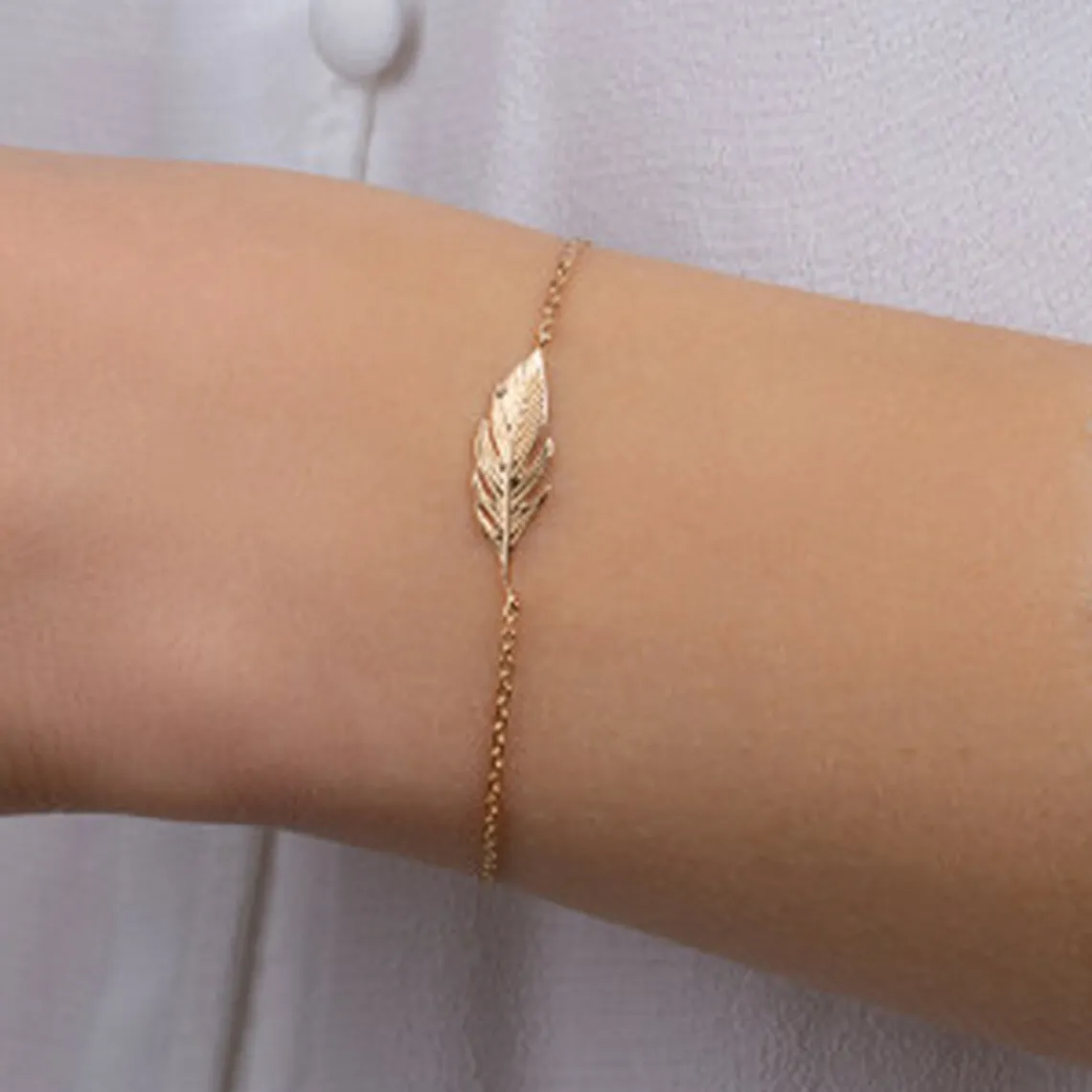 Maison de la Bijouterie Bracelet Femme fantaisie plume plaqué or UYZ353ZV | Femme Bracelet