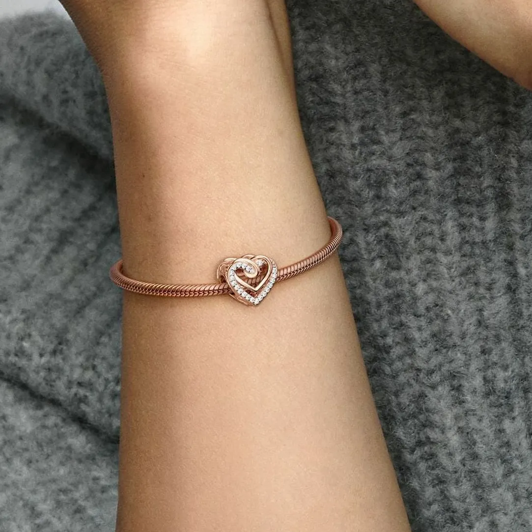 Pandora Charm Métal doré à l'or rose fin 585/1000 Cœurs Entrelacés Scintillant Bijoux | Femme Charms
